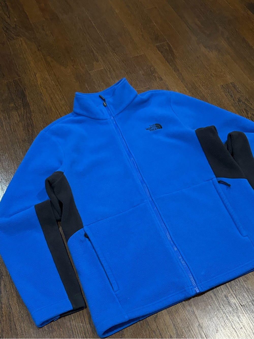 The North Face blue fleece jacket
